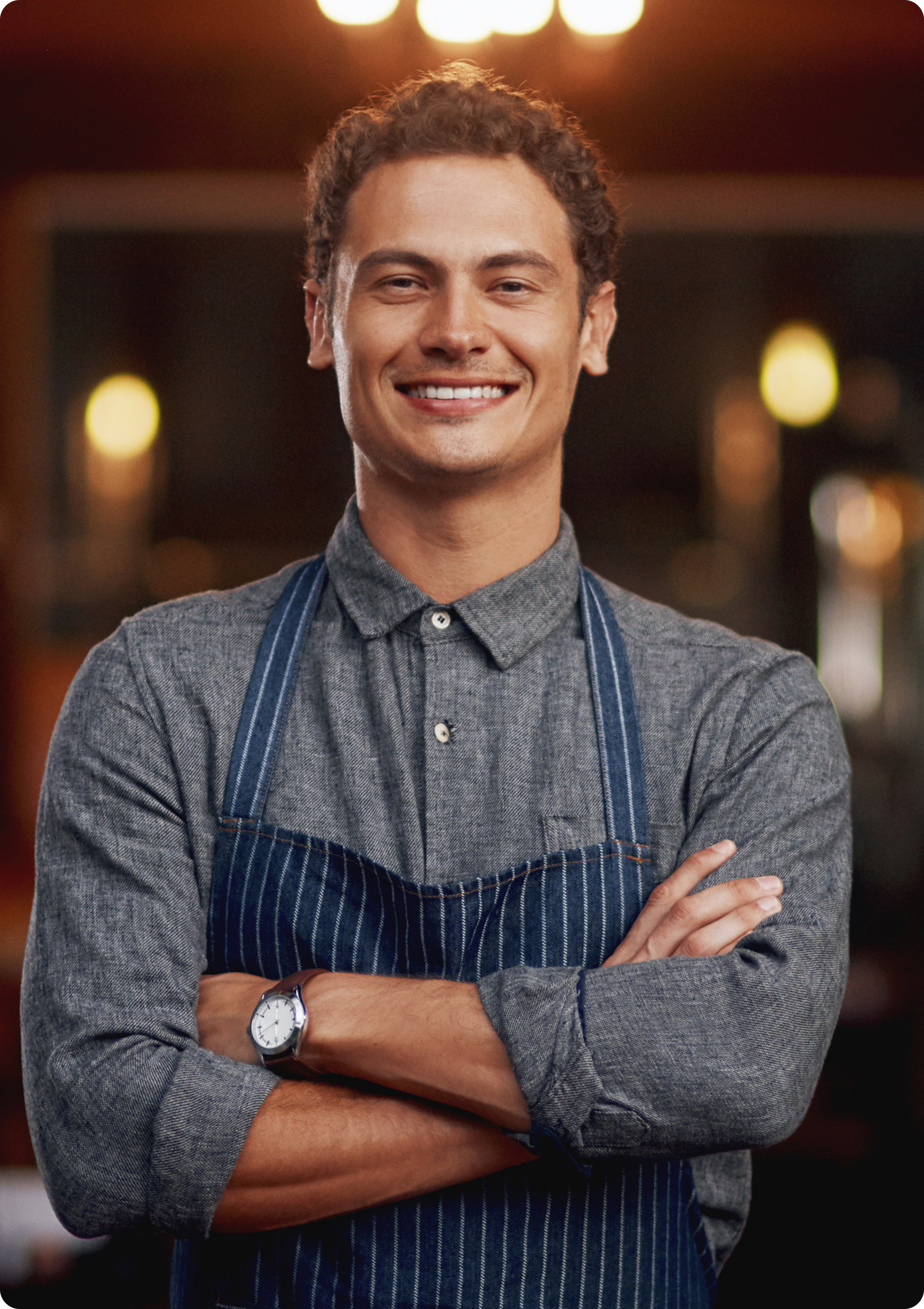 Retail team member in striped apron